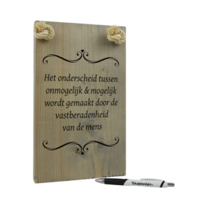 tekst op hout tekstbord - het onderscheid tussen onmogelijk en mogelijk