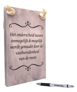 tekst op hout tekstbord - het onderscheid tussen onmogelijk en mogelijk